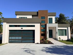 a rendering of a house with a garage at New Upscale & Modern Heated Pool Home in Walkable Downtown! in Sarasota