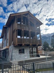a house being constructed on top of a building at BORMIO Apartment AL PRADAIS in Bormio