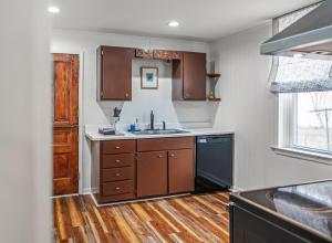 a kitchen with a sink and a dishwasher at Broadway Cottage - Town, Hot Tub, Fire Pit, Grill, Wifi, Family Friendly, Pet Friendly in Berkeley Springs +44 photos