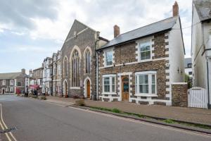 a row of brick houses on a street at 3 Bed in Beer oc-jbvalh in Beer