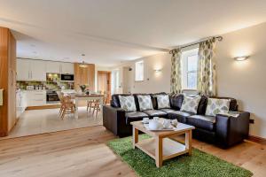 a living room with a couch and a table at 2 Bed in Gilwern oc-o27004 in Gilwern