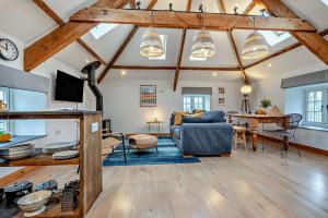 a living room with a couch and a table at 1 Bed in Werrington oc-c29073 in Werrington