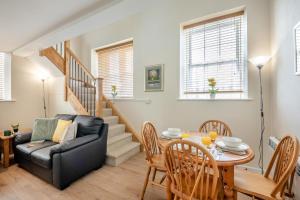 a living room with a table and a couch at 1 Bed in Berwick-upon-Tweed oc-c32028 in Kyloe