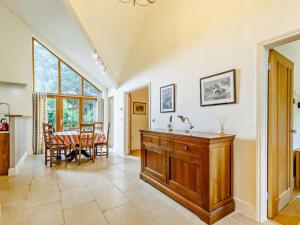 a kitchen and dining room with a table at 3 Bed in Holt oc-83628 in Blakeney