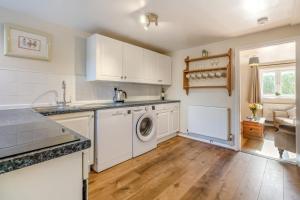 a kitchen with a washer and dryer at 2 Bed in Ashley oc-c32637 in Ashley