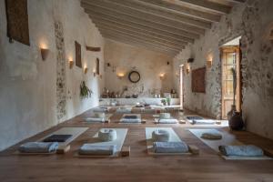 a room with many pillows on the floor at Agroturismo Son Boronat in Calvià