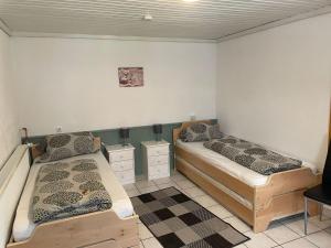 a room with two beds in a room at Apartment Appartement Wasserfall by Interhome in Stall