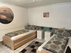 a bedroom with two beds in a room at Apartment Appartement Wasserfall by Interhome in Stall