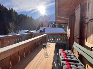 a balcony with a view of a snow covered mountain at Apartment Peak App- Morgins by Interhome in Morgins