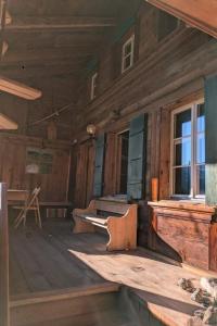 an empty porch of a wooden cabin with a window at Apartment Ferienwohnung by Interhome in Blankenburg