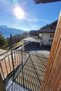 a view from the balcony of a house at Apartment Chalet Lilo Big view by Interhome in Beatenberg