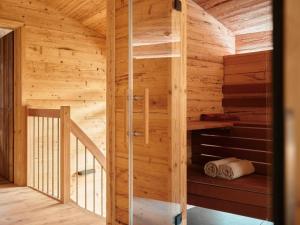 a wooden sauna with a ladder in a cabin at Apartment My Chalet by Interhome in Meiringen