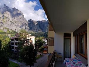 a balcony with a view of a mountain at Apartment Royal 22 nahe Klinik- Burgerbad- Einkaufszentrum by Interhome in Leukerbad