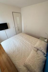 a bedroom with a large bed in a room at Apartment Walserwohnung by Interhome in Bosco Gurin