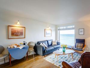 a living room with a couch and a table at 2 Bed in Berwick-upon-tweed oc-82189 in Spittal