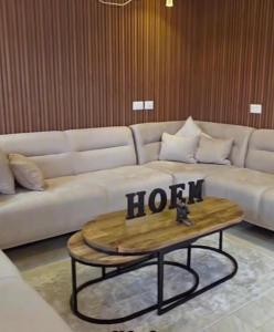a living room with a couch and a coffee table at New view in Majdal Shams +1 photo