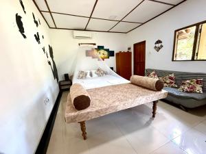 a bedroom with a bed in a room at Valampuri Kite Resort in Kalpitiya +103 photos