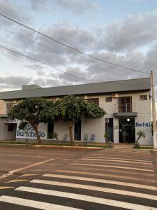 a building with a tree in front of a street at Hotel Barichello in São Miguel das Missões +27 photos