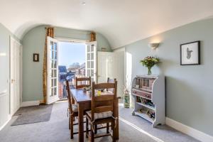 a dining room with a table and chairs at 1 Bed in Queen Camel oc-c30506 in Queen Camel
