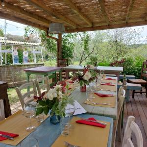 a table set up for a meal on a patio at Orto delle Fate in Marta