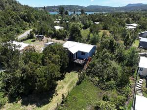 an aerial view of a house in the trees at Casa completa en Carretera Austral KM 23 con Fibra Óptica in Puerto Montt