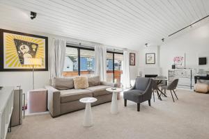 a living room with a couch and a table at Gavilon Aspen Studio in Aspen +23 photos