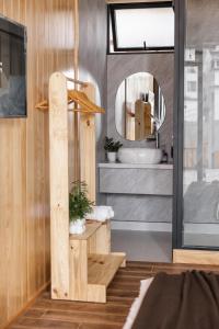 a bathroom with a sink and a mirror at Bin Home in Ấp Kim Thạch +47 photos