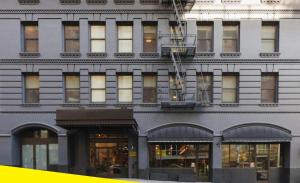 a tall building with a lot of windows on it at Bposhtels San Francisco in San Francisco