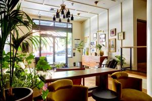 a room with a table and chairs and plants at Bposhtels San Francisco in San Francisco +29 photos