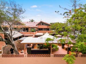 an aerial view of a house with a roof at Aquarius Backpackers Resort in Byron Bay