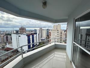 a balcony with a view of a city at Ed Las Vegas by Select Stays in Chapecó