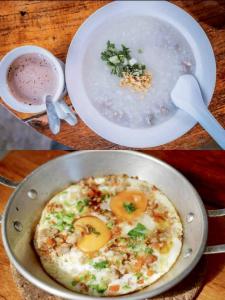 a bowl of soup and a plate of food with a pizza at บ้านสุจิปุรี BaanSujipuri in Pak Chong