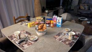 a table with food and drinks on top of it at Shanaël in Gap