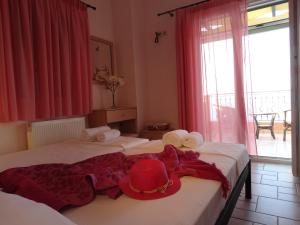Ένα ή περισσότερα κρεβάτια σε δωμάτιο στο Villa Stamata +36 φωτογραφίες