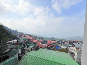 a view of a city with buildings at Singalila Retreat by Barsana Group Darjeeling in Darjeeling