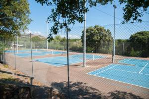 a row of tennis courts on a tennis court at Domaine de Sonia - Logements éco-insolites in Porto-Vecchio