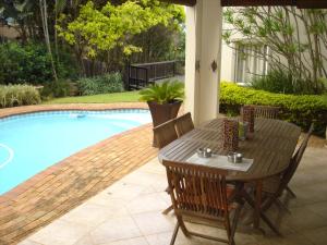 En terrasse eller udendørsområde på Bella Vista Guest House