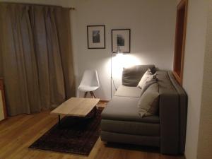 a living room with a couch and a table at Apart Christa in Kaunertal