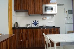 Kuchyňa alebo kuchynka v ubytovaní Apartament Ariańska + 13 fotografií
