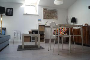 Posedenie v ubytovaní Apartament Ariańska