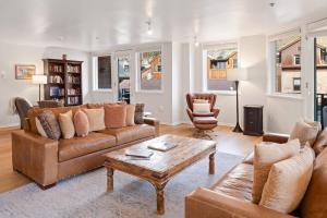 a living room with a couch and a coffee table at Ice House 317 condo in Telluride