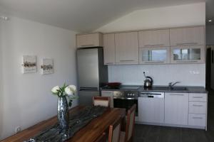 Kuchyň nebo kuchyňský kout v ubytování Villa Mare