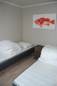 Säng eller sängar i ett rum på Lofoten Cabins - Sund