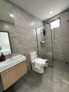 a bathroom with a sink and a toilet and a shower at 2 Bedroom Modern House in Ban Nong Chaeng +18 photos