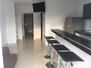 Kuchyň nebo kuchyňský kout v ubytování Mayva AprtaHotel