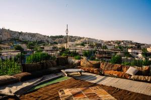 a large couch sitting on top of a building at Lord of Cappadocia Hotel in Göreme +32 photos