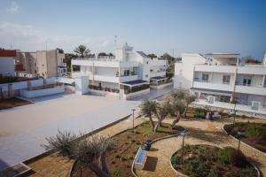 an aerial view of a city with white buildings at Casa Costa Sud in Bari