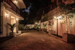 a courtyard of a building at night with lights at Sky Garden Kandy in Kandy