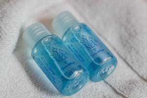 a close up of a bottle of toothpaste on a towel at Residence "Professor's nest" - Verona Apartments in Verona