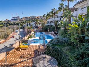 a view of a swimming pool with a resort at Duquesa Sea & Sun in Manilva